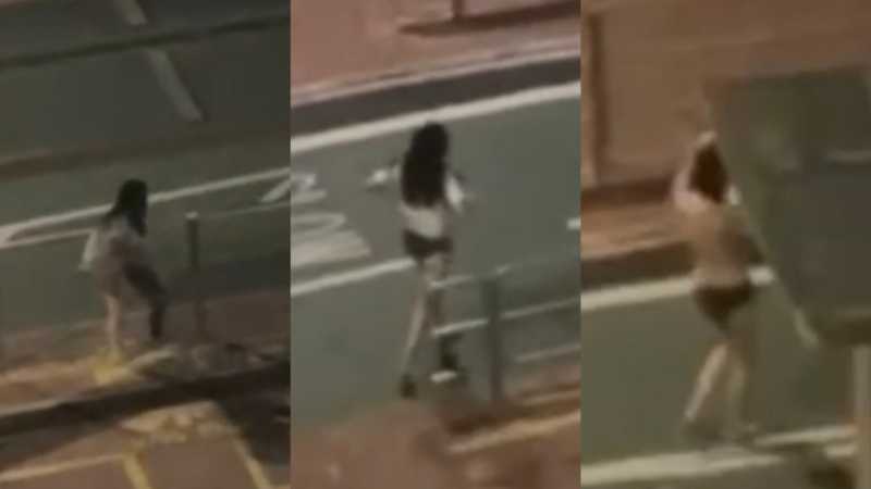 屯门半裸女造福观众 与男友吵架马路暴走狂脱衣服